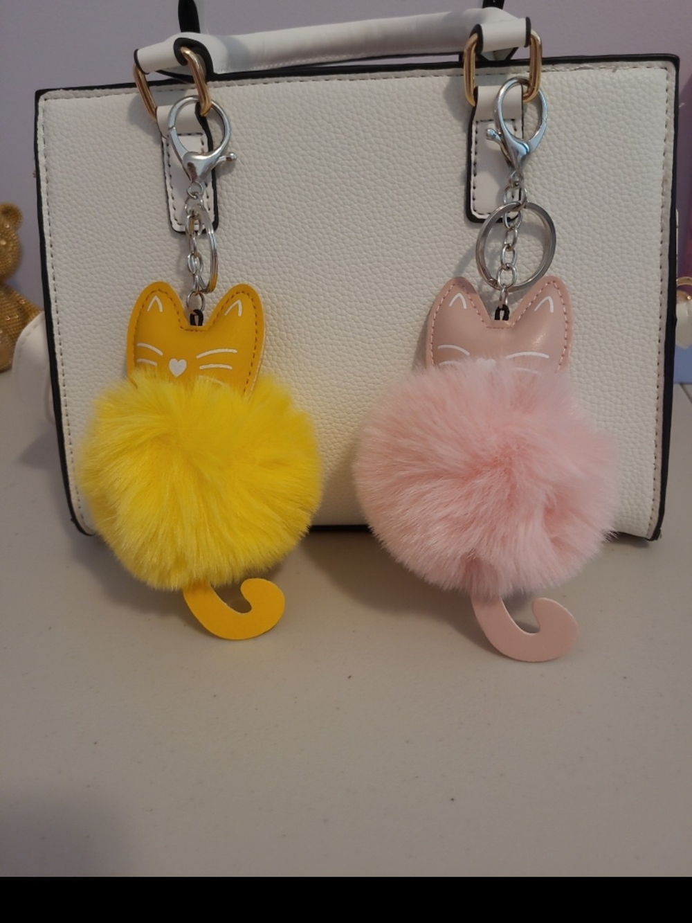 Fuzzy Cat Pom Pom Keychain Duo - Yellow & Pink
